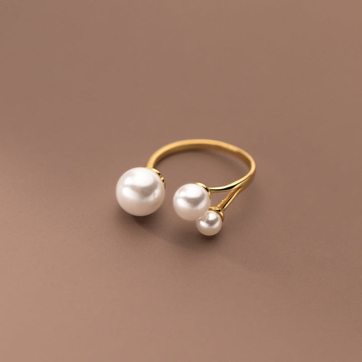 Bague en perles d'eau douce triple ajustable