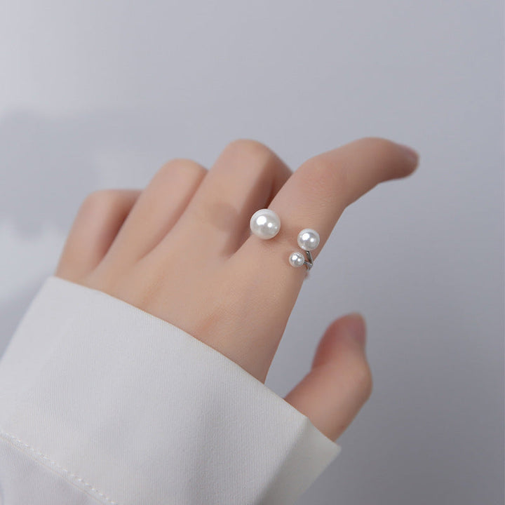 Bague en perles d'eau douce triple ajustable